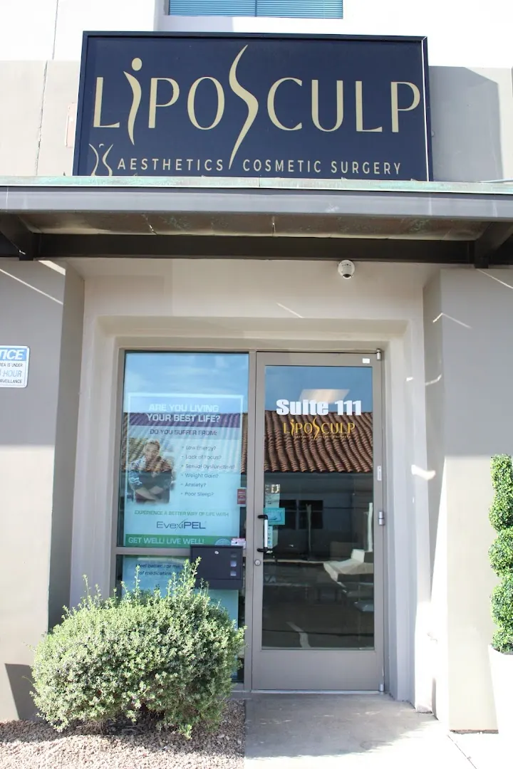LipoSculp Aesthetics Cosmetic Surgery sign above a glass door marked Suite 111