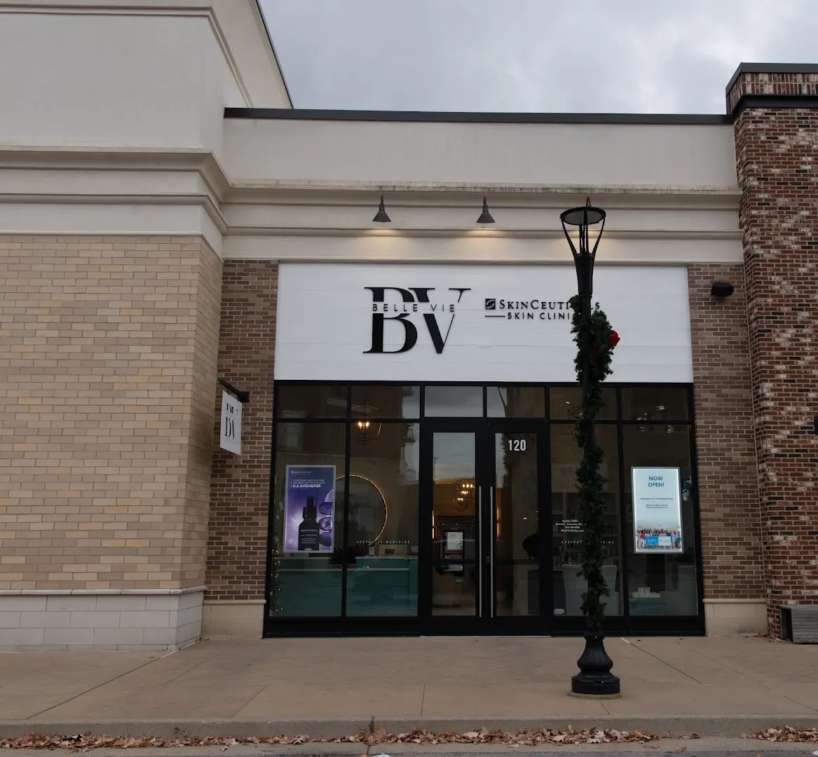 Belle Vie storefront with BV SkinCeuticals Skin Clinic sign above glass doors numbered 120