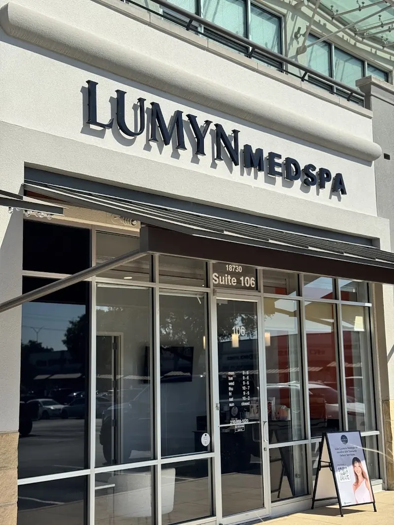 Lumyn Medspa storefront with dark lettering above a glass entrance marked 18730 Suite 106